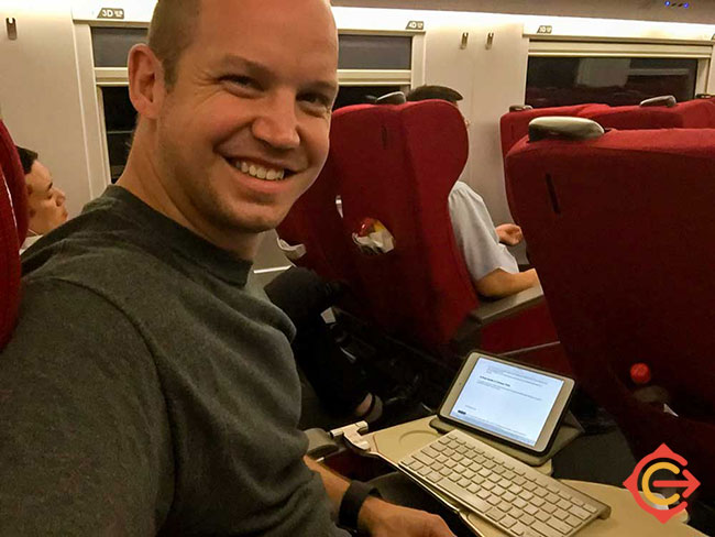 Me writing this guide while on a China train.