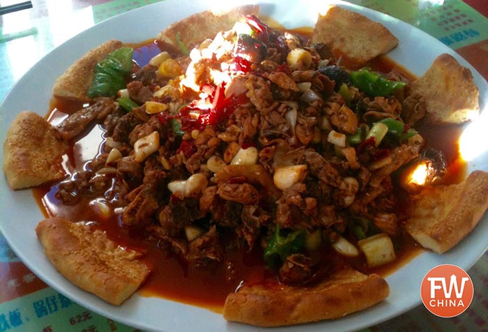 Xinjiang Big Plate Chicken, known as DaPanJi (新疆大盘鸡) is a wonderful dish from western China.